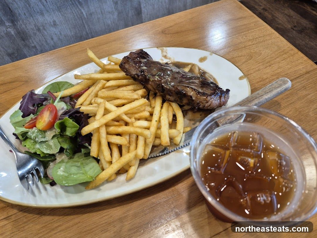 Steak and Fries with Salad and Iced Drink