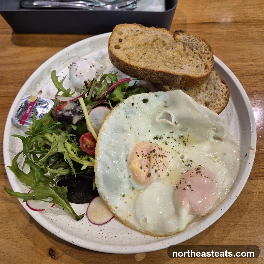 Fried Eggs with Salad and Toast