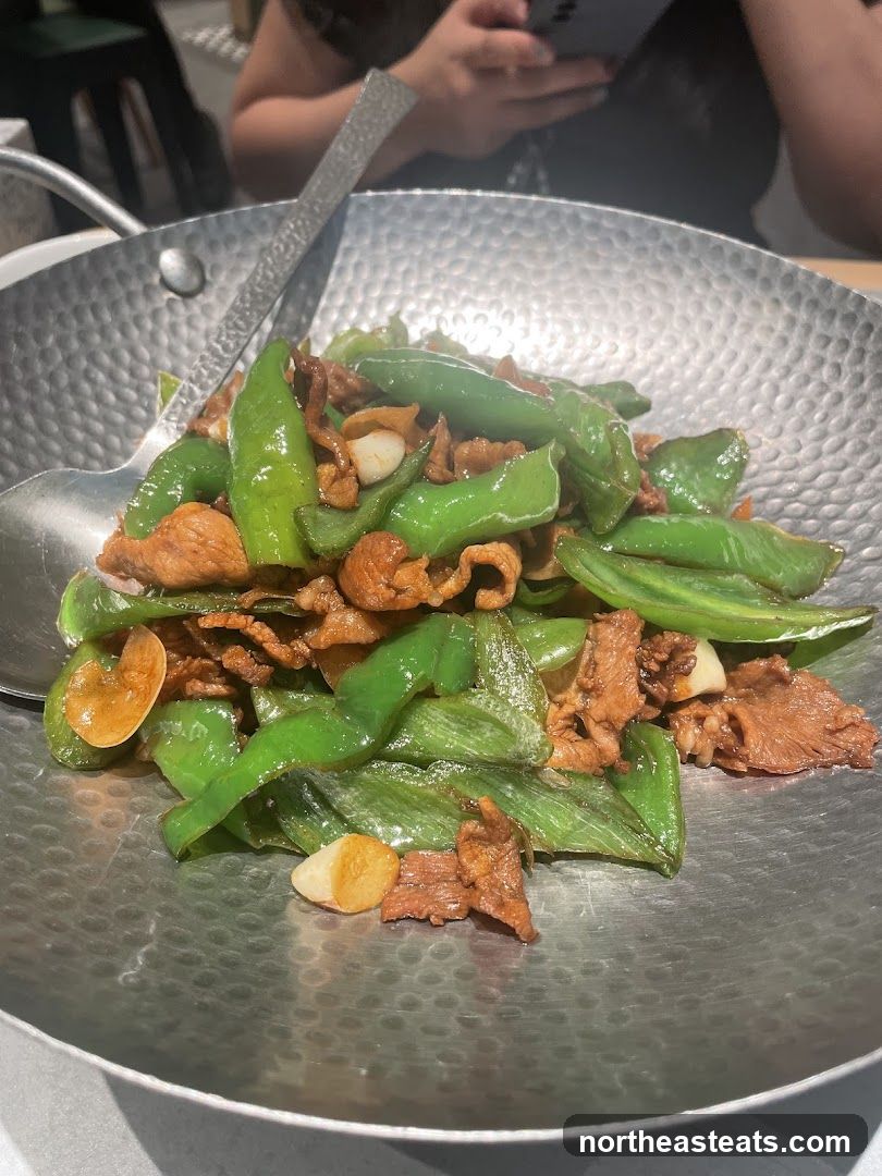 Stir-fried dish with green peppers and meat