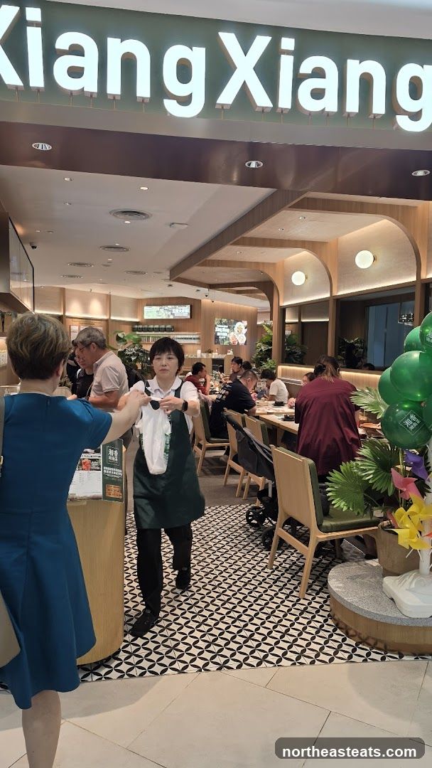 Restaurant Interior with Staff and Diners