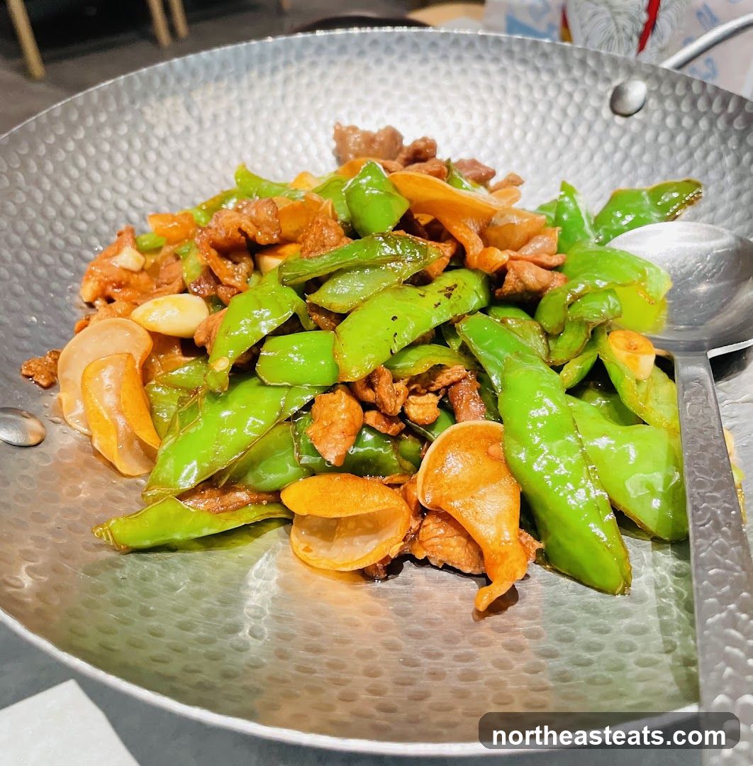 Stir-fried dish with green peppers and meat