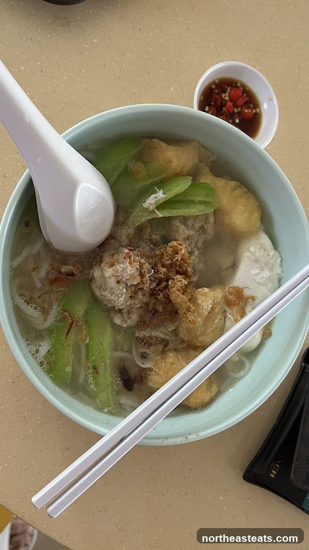 Bowl of Noodles with Side Condiments