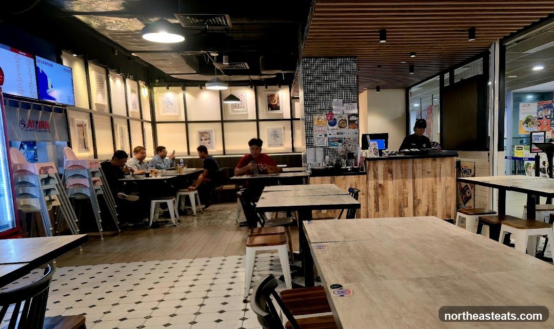 Restaurant Interior with Dining Tables and Staff