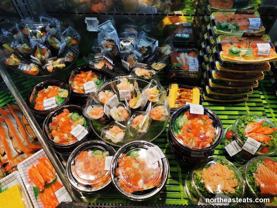 Assortment of Sushi and Seafood Dishes