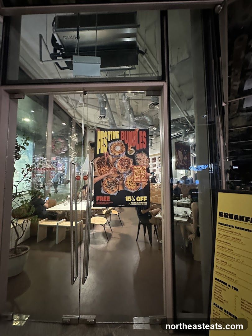 Restaurant Entrance with Menu and Advertisement