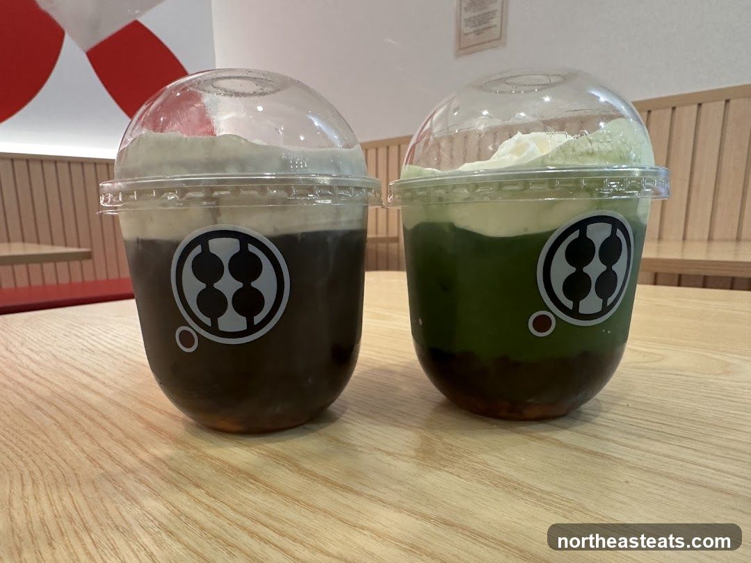 Two drinks with cream topping