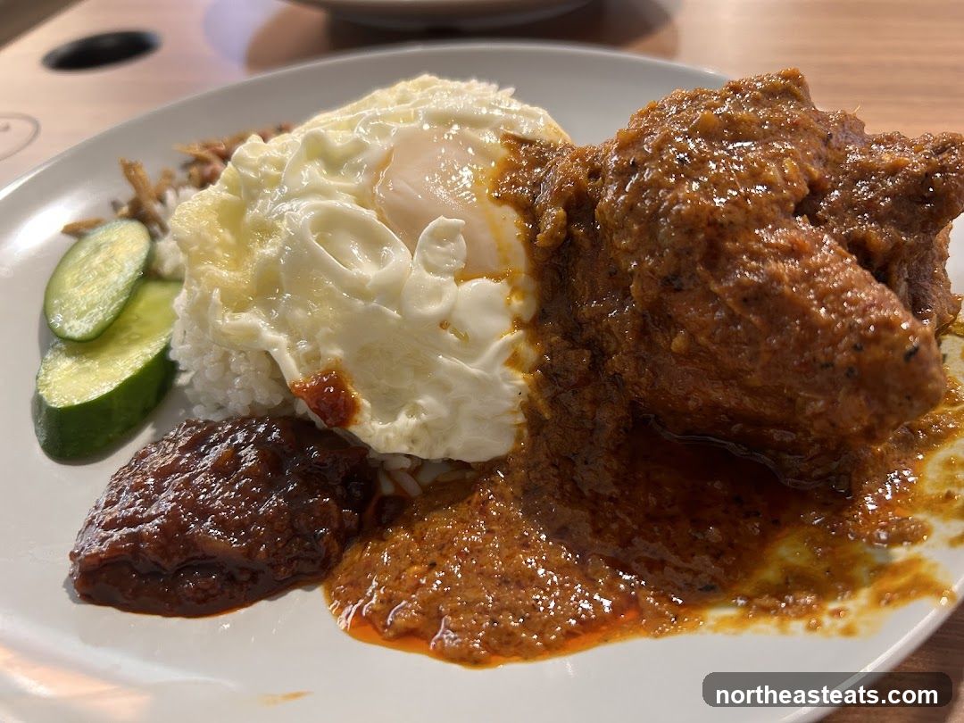 Nasi Lemak with Chicken Rendang
