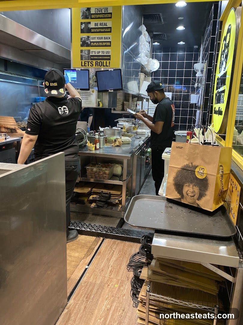 Kitchen Staff Preparing Orders