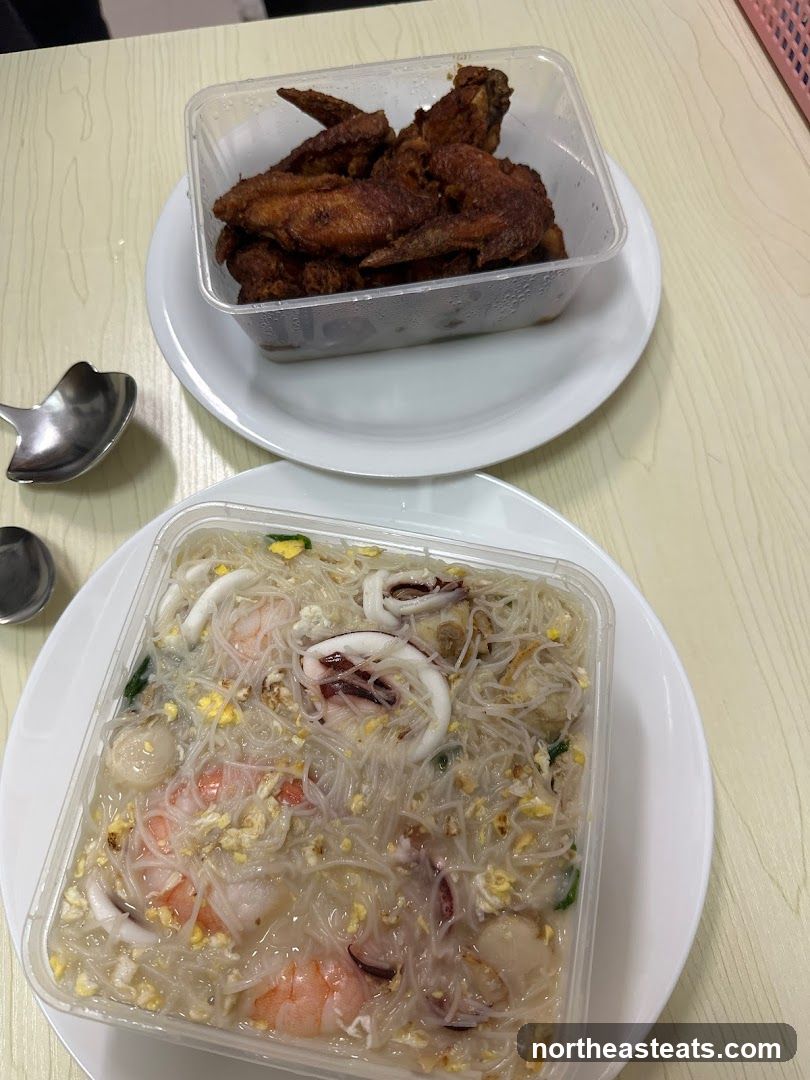 Fried Chicken Wings and Seafood Noodles