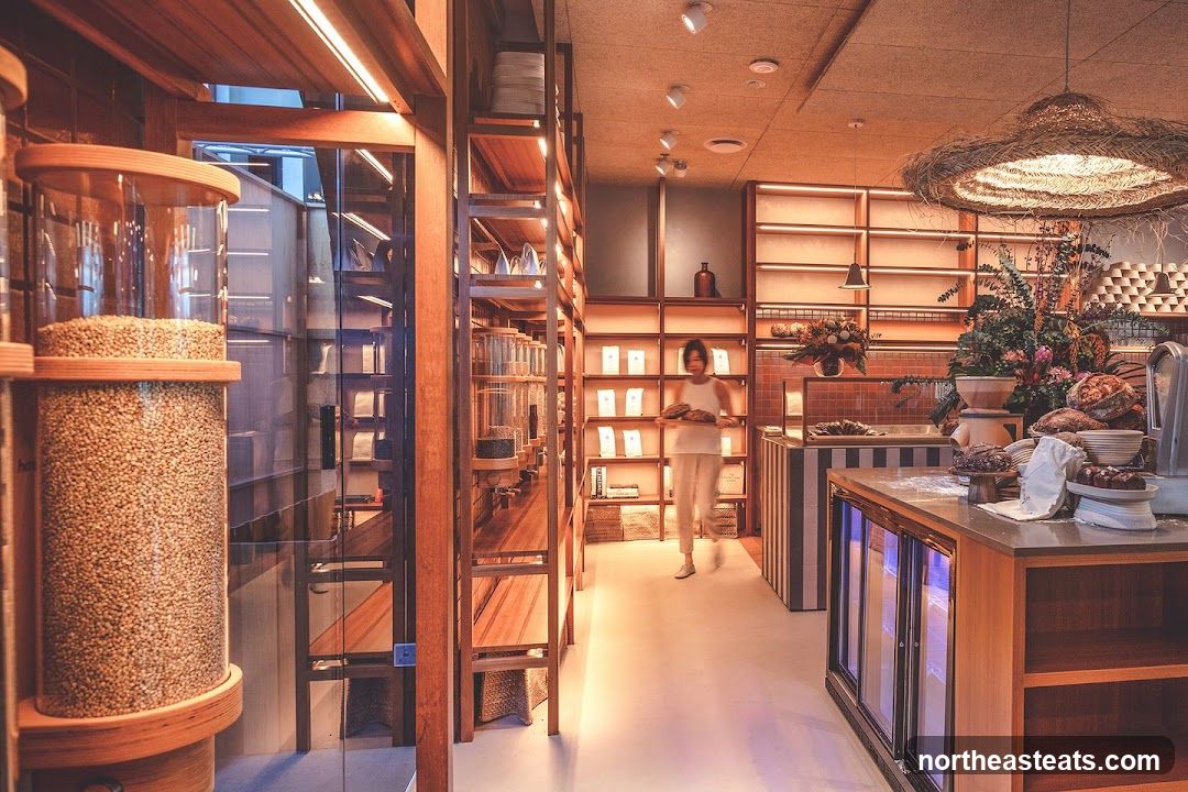Interior of a bakery with display shelves and baked goods