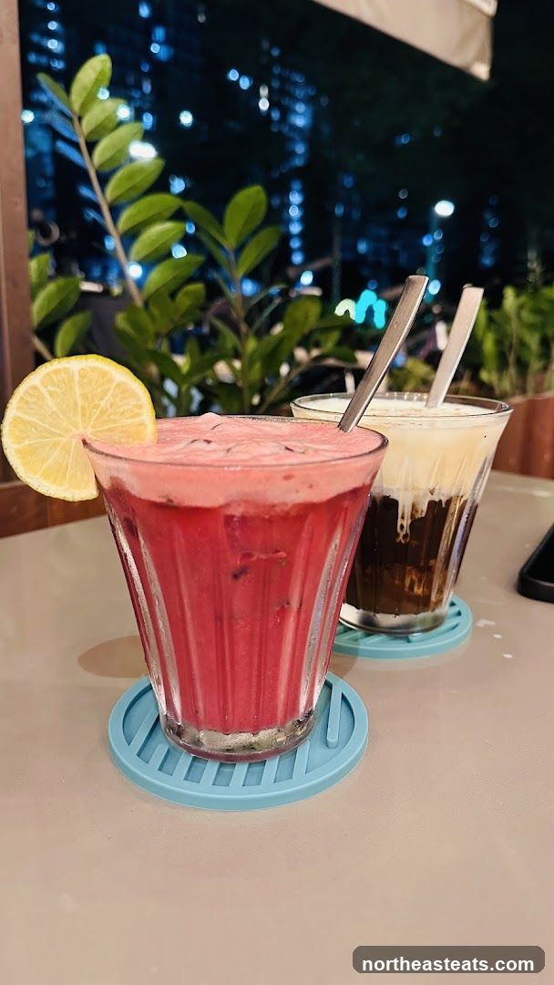 Two drinks on coasters