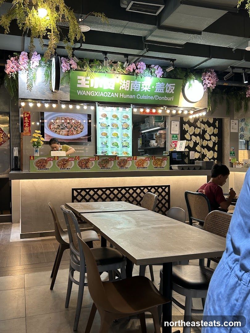 Food stall with menu and seating