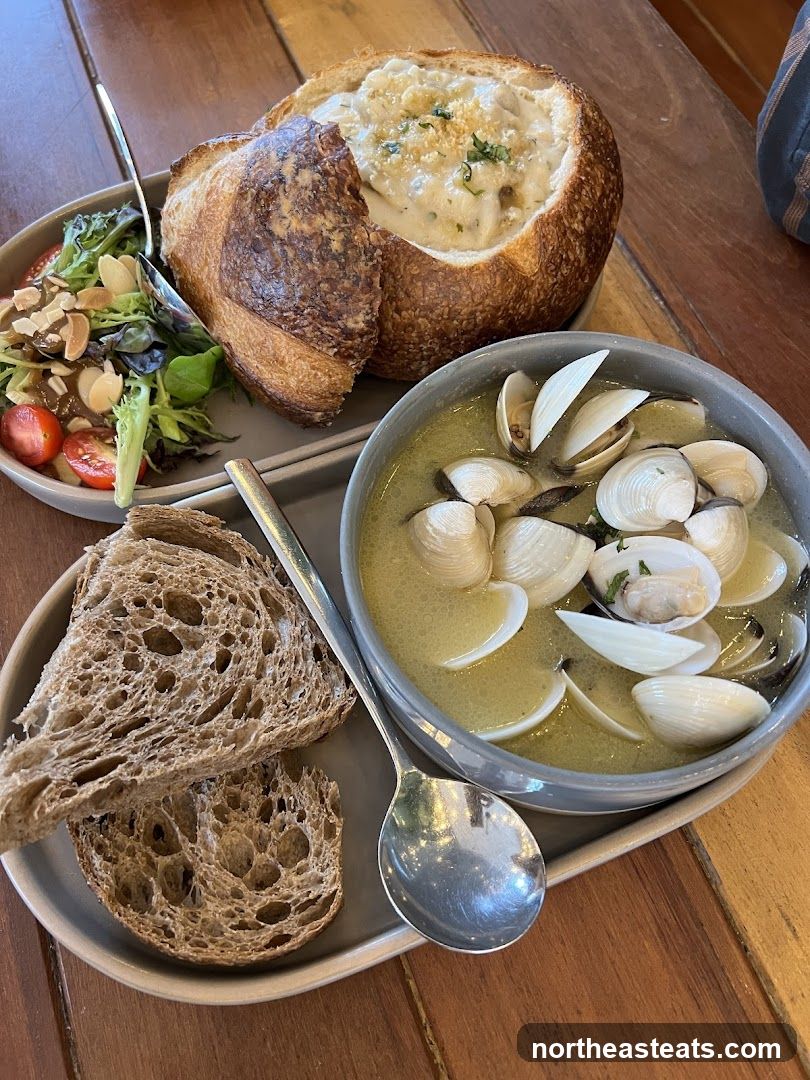 Clam Chowder in a Bread Bowl with Salad and Bread