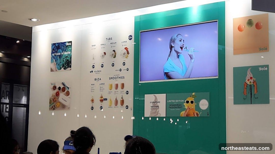 Yolé Frozen Yogurt Menu and Display