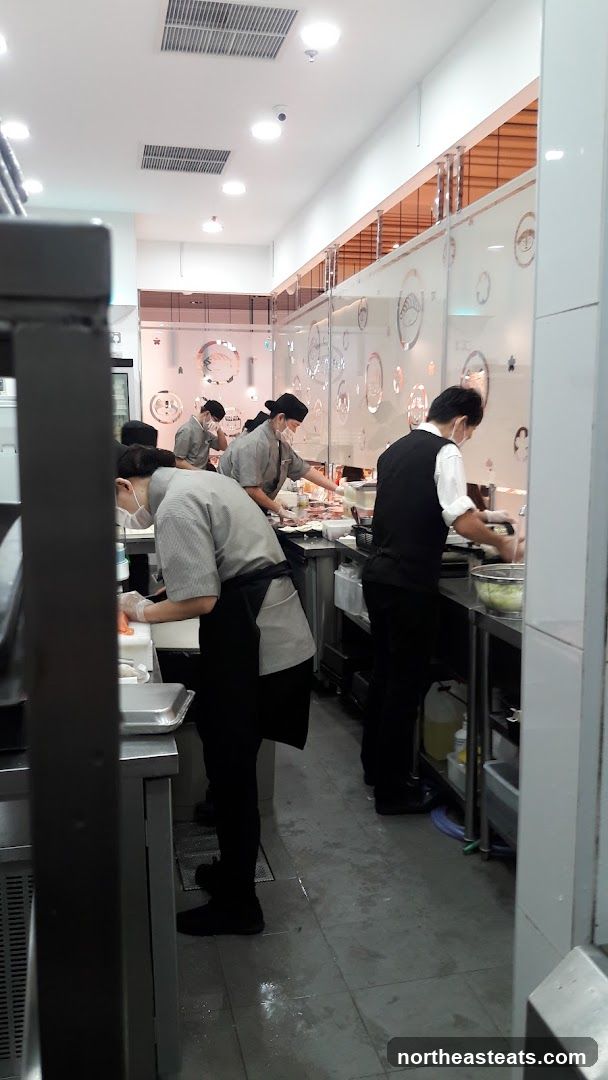Kitchen Staff Preparing Food
