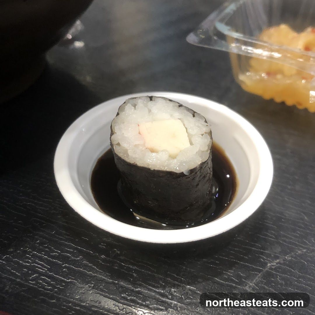 Sushi Roll in Soy Sauce