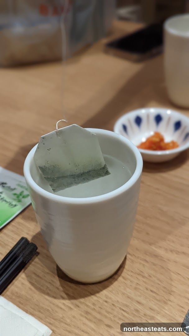 Tea Bag Steeping in Cup