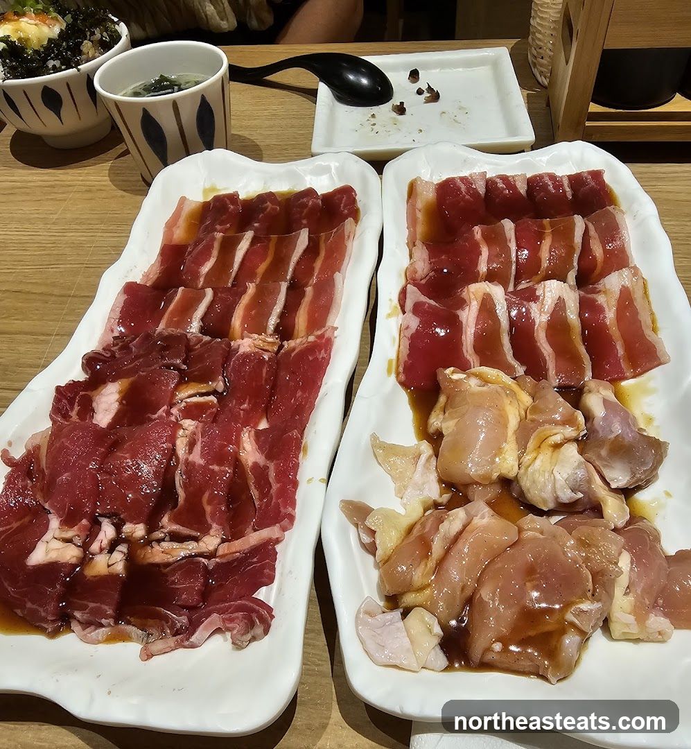 Plates of Raw Meat and Chicken