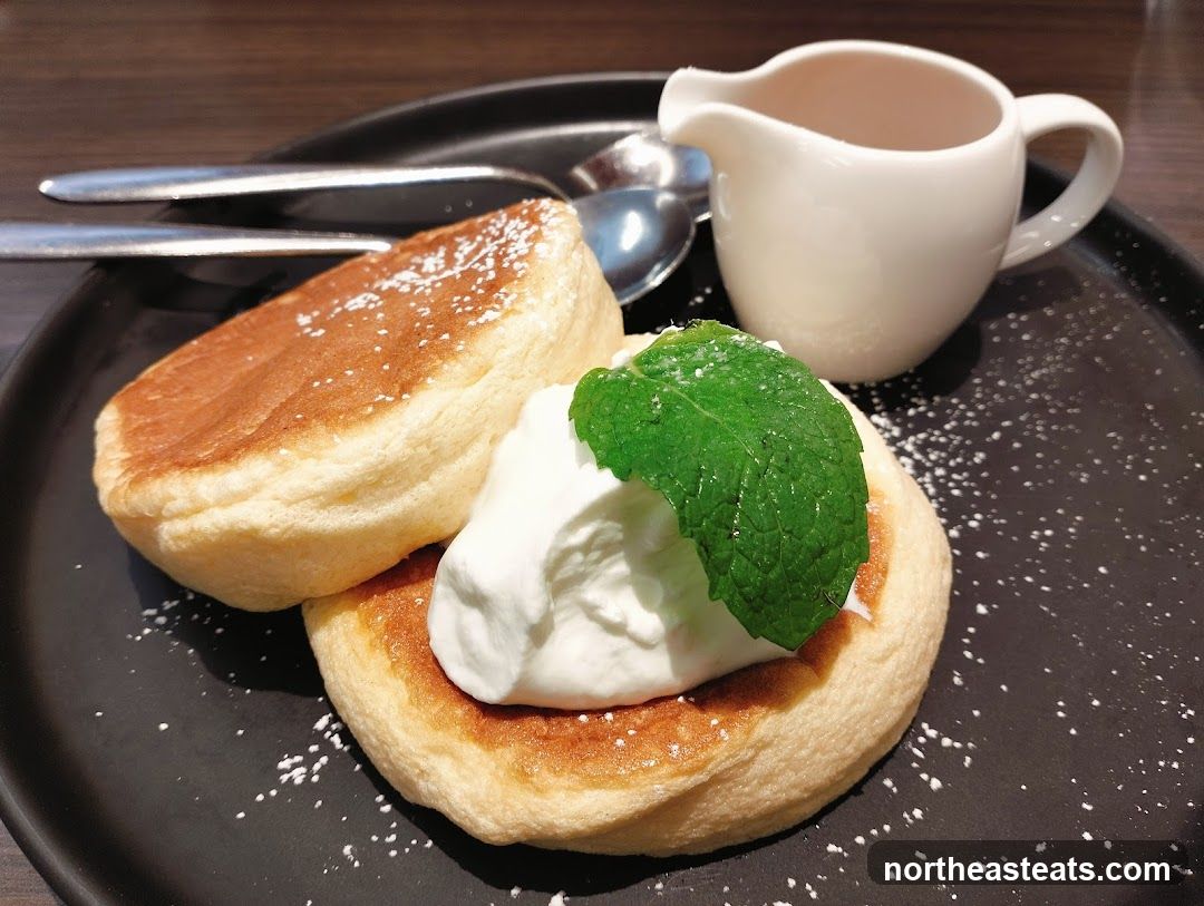 Fluffy Pancakes with Whipped Cream and Mint