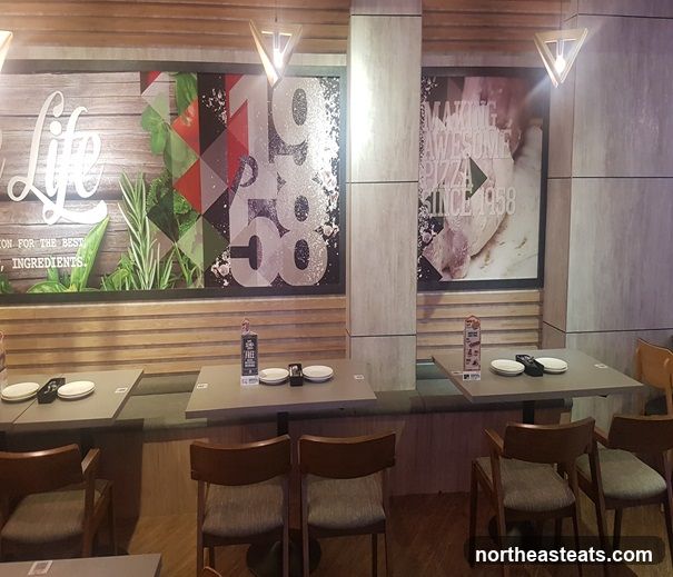 Restaurant Interior with Seating and Wall Art