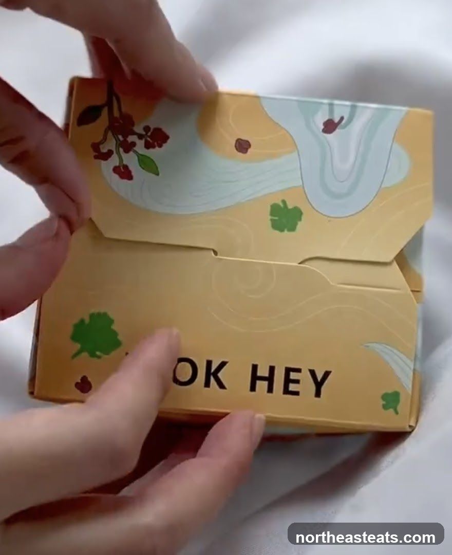 Box with "OK HEY" text