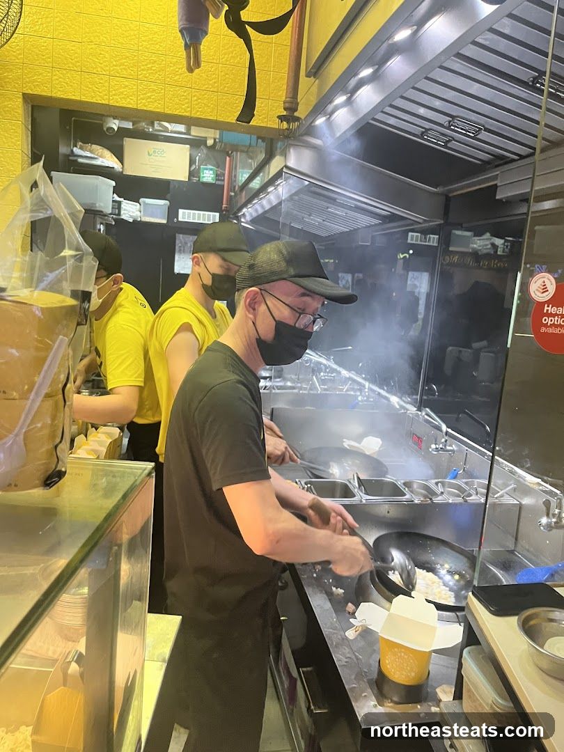 Chefs cooking in a restaurant kitchen