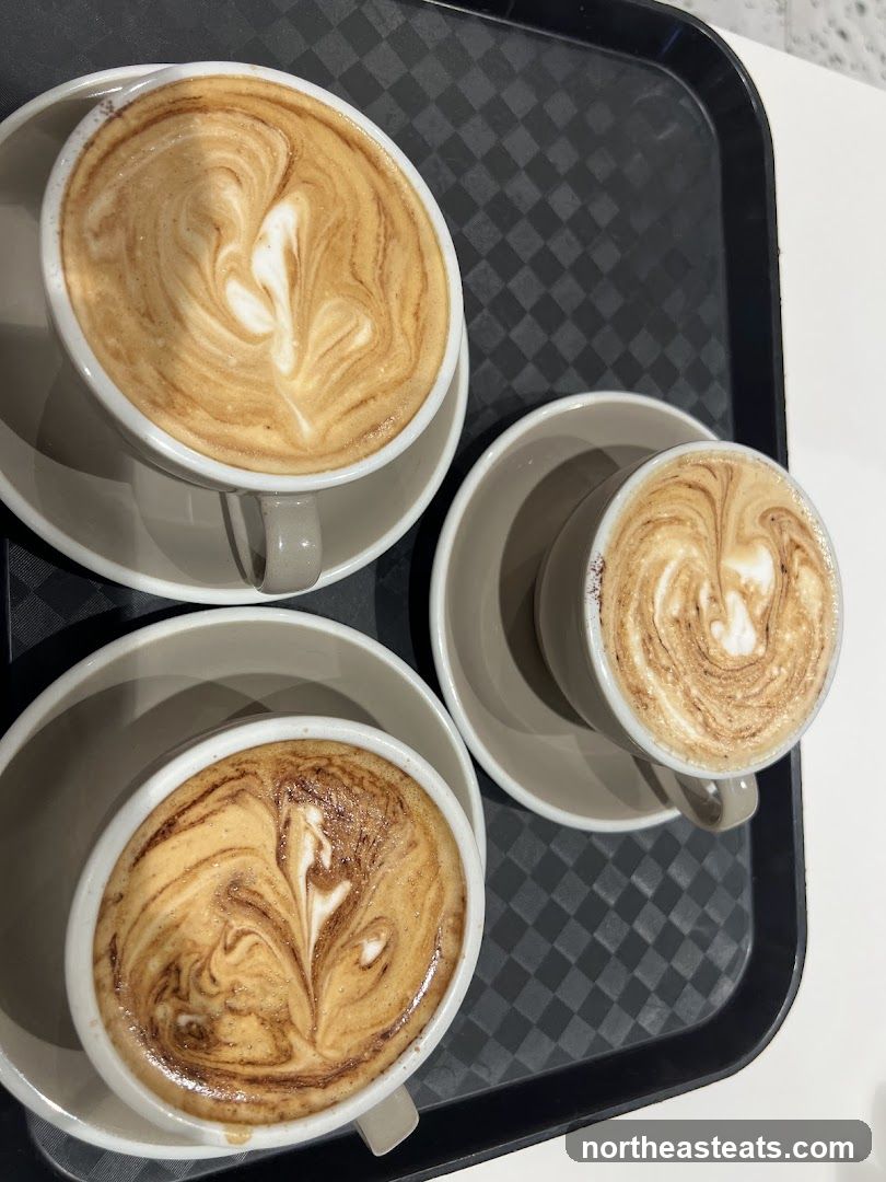 Three Coffees with Latte Art