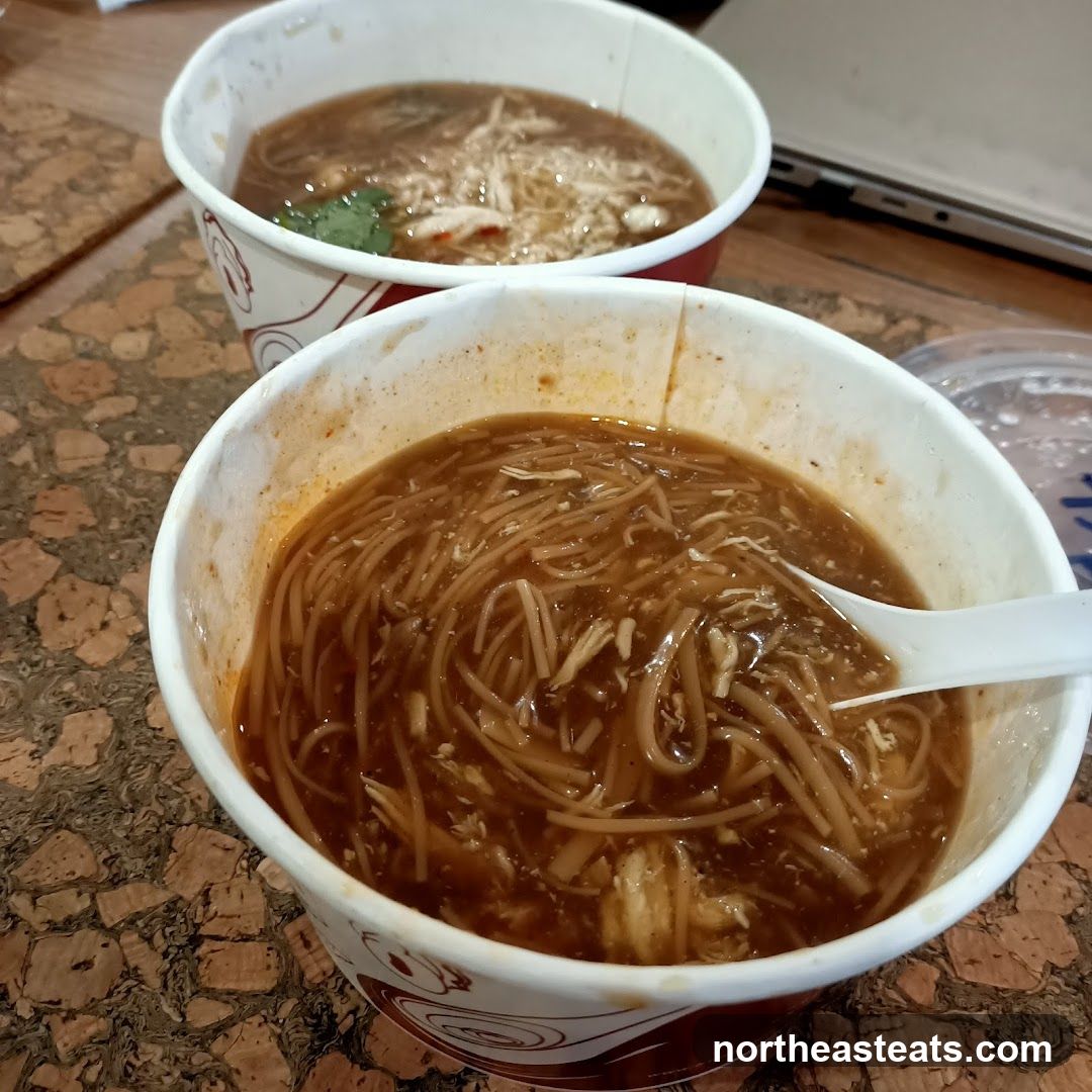 Two bowls of noodle soup