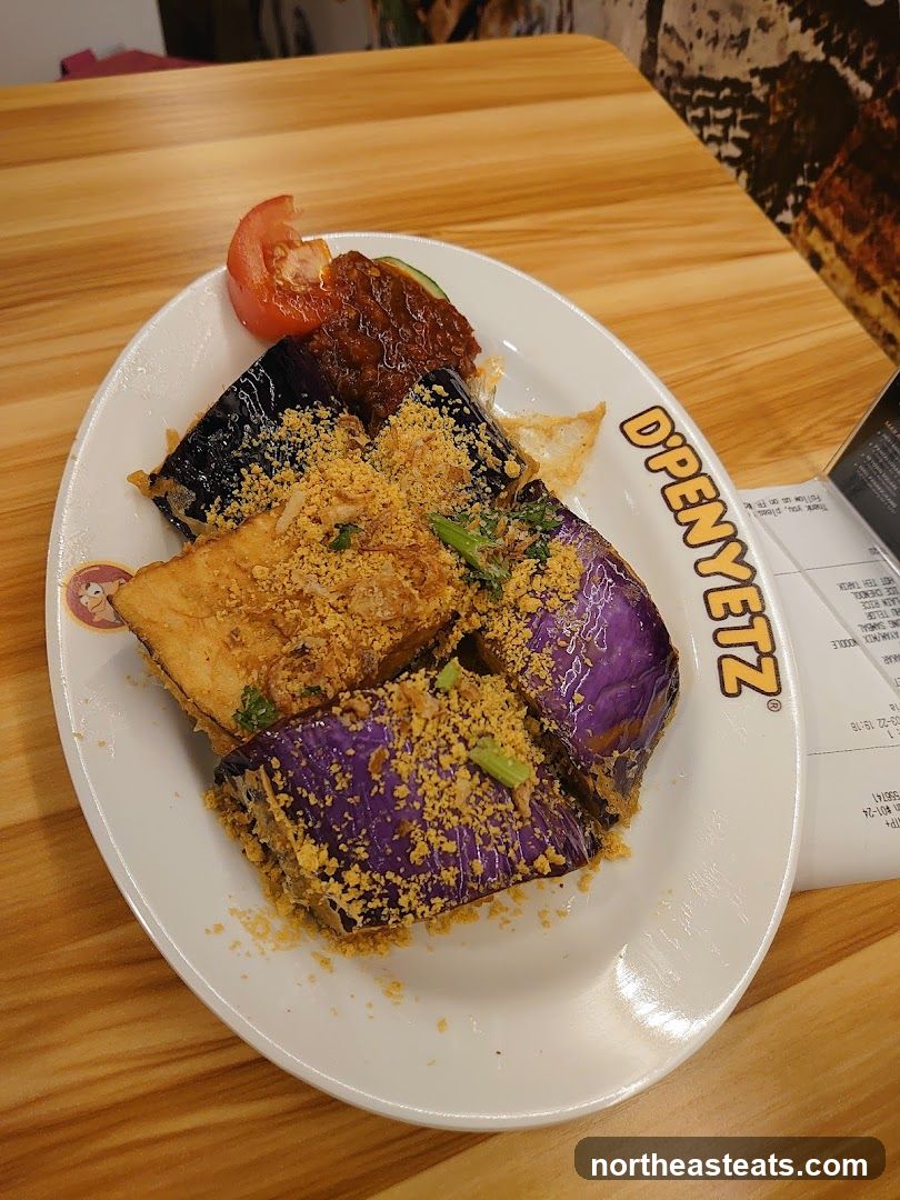 Fried Eggplant and Fish Dish