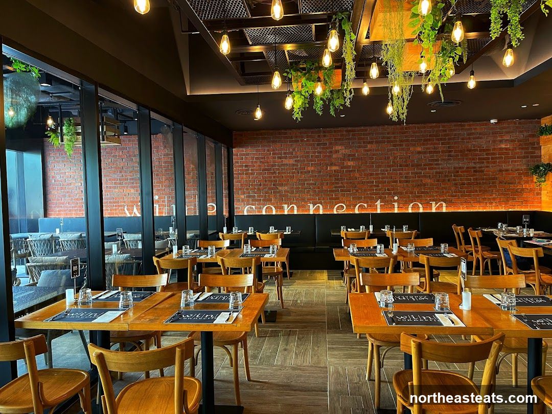 Restaurant Interior with Brick Walls and Hanging Plants