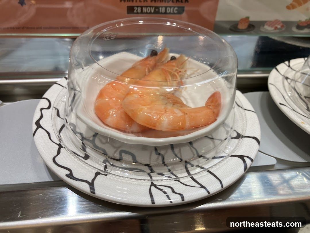 Shrimp on a conveyor belt