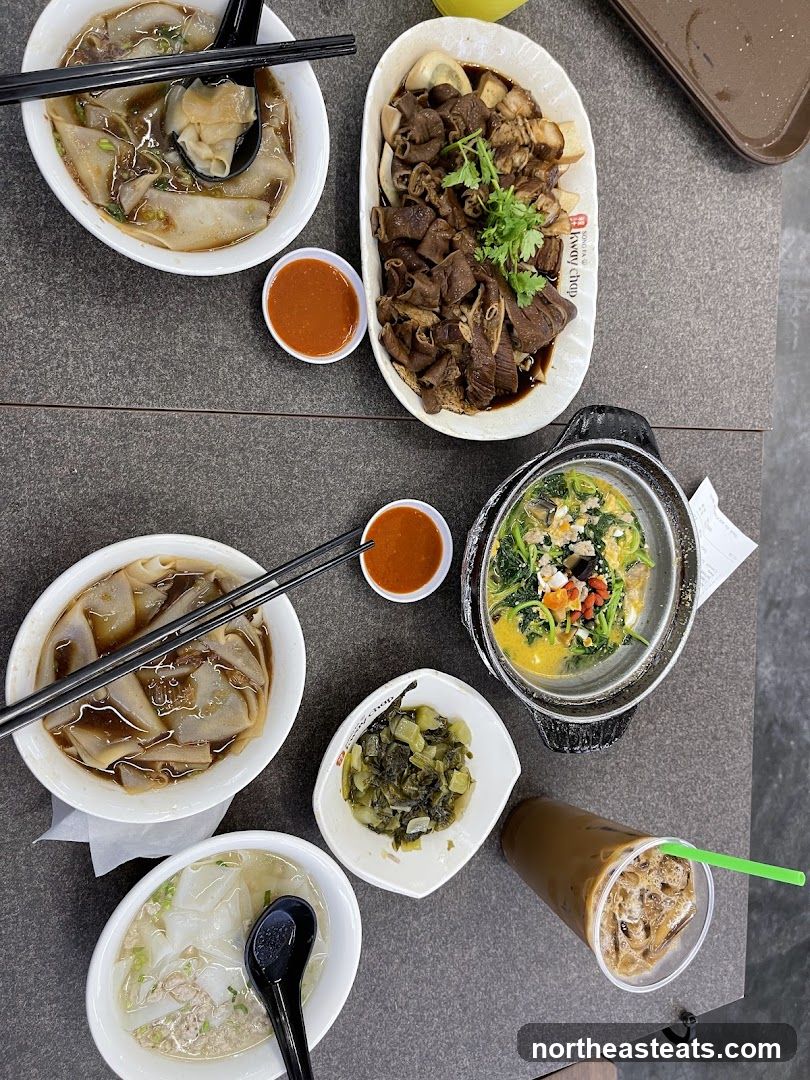 Table with various dishes and a drink