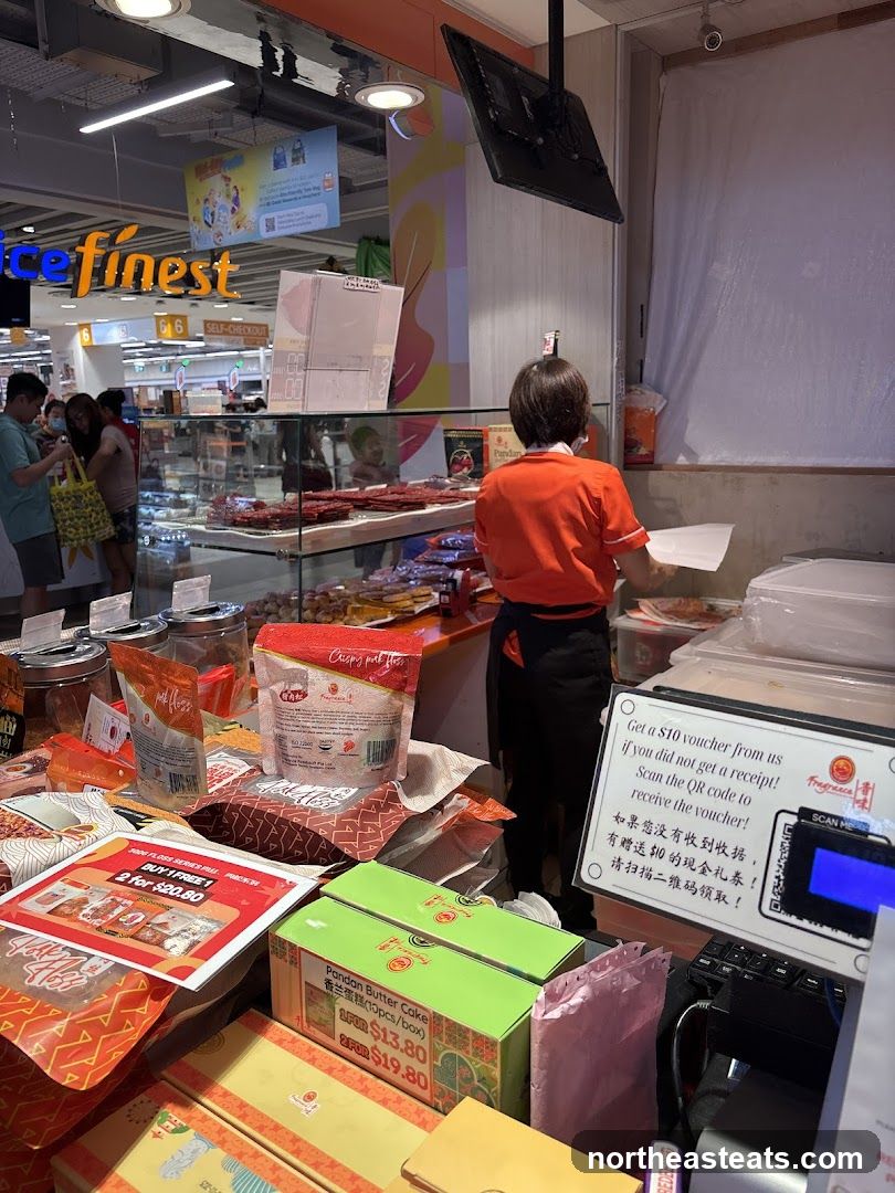 Food stall with various snacks and cakes