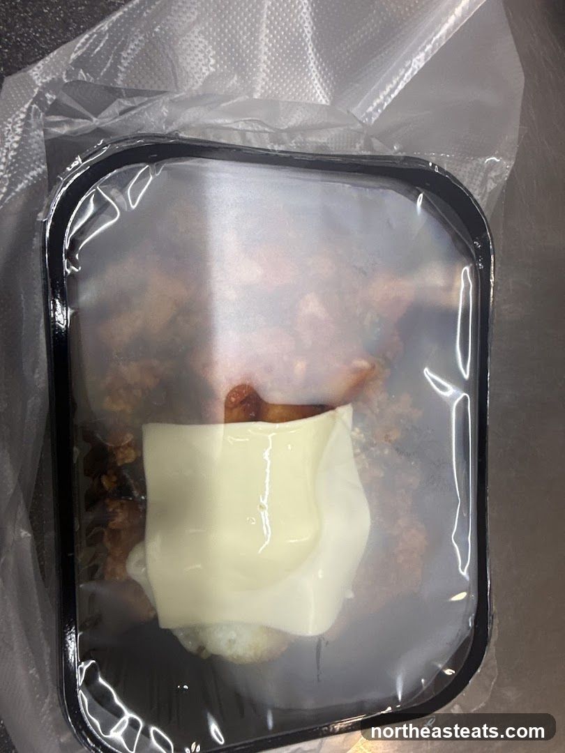 Food container with cheese and meat