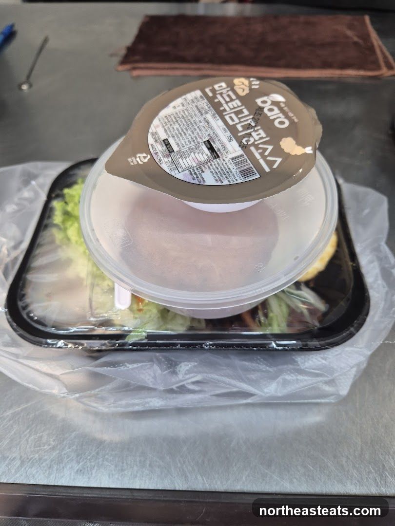 Food Container with Sauce