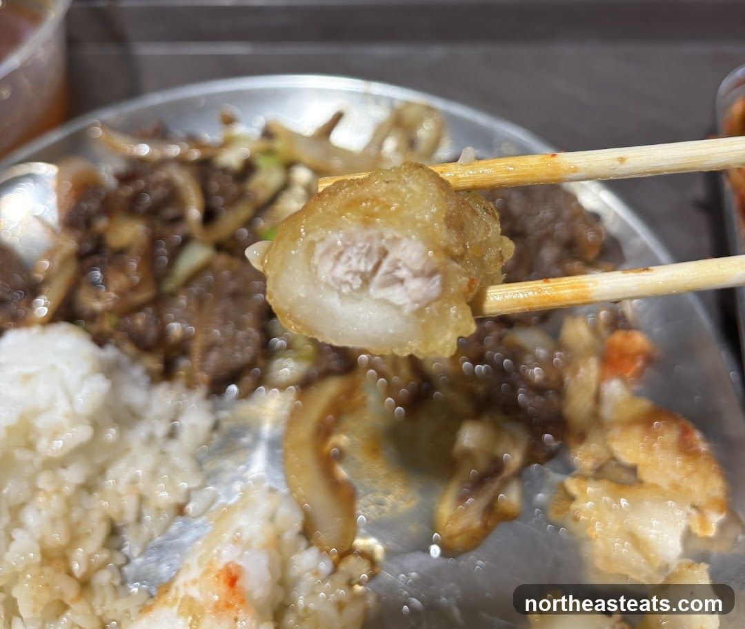 Close-up of a meal with chopsticks