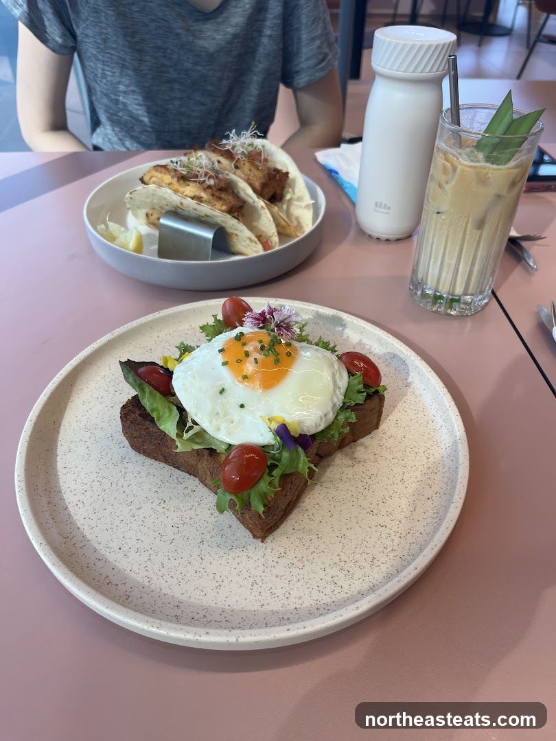 Brunch spread with tacos and open-faced sandwich