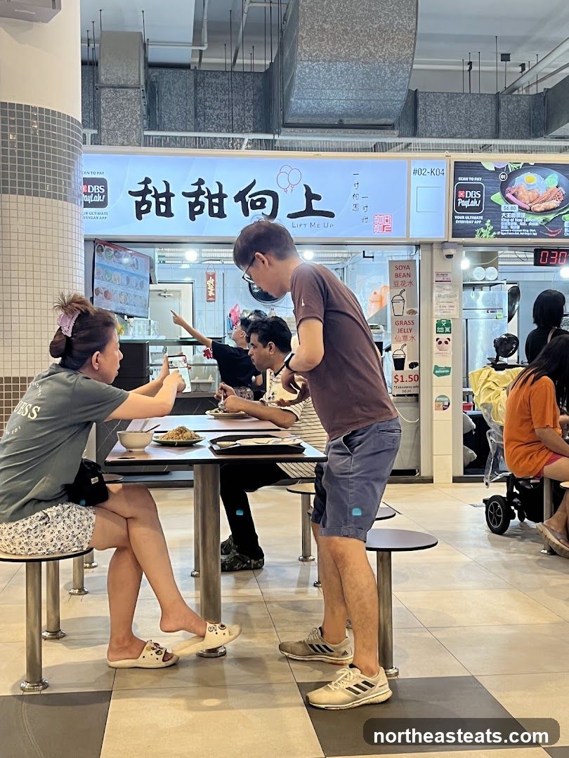 People eating at a food court