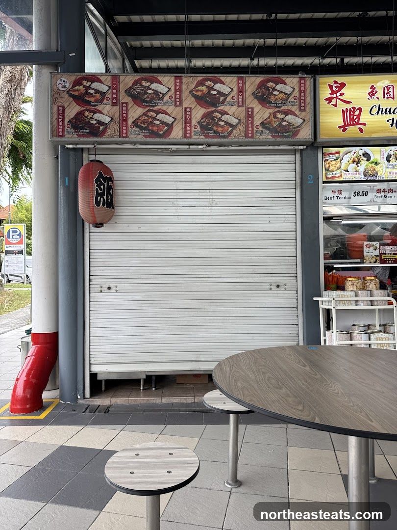 Food Stall with Bento Boxes and Menu