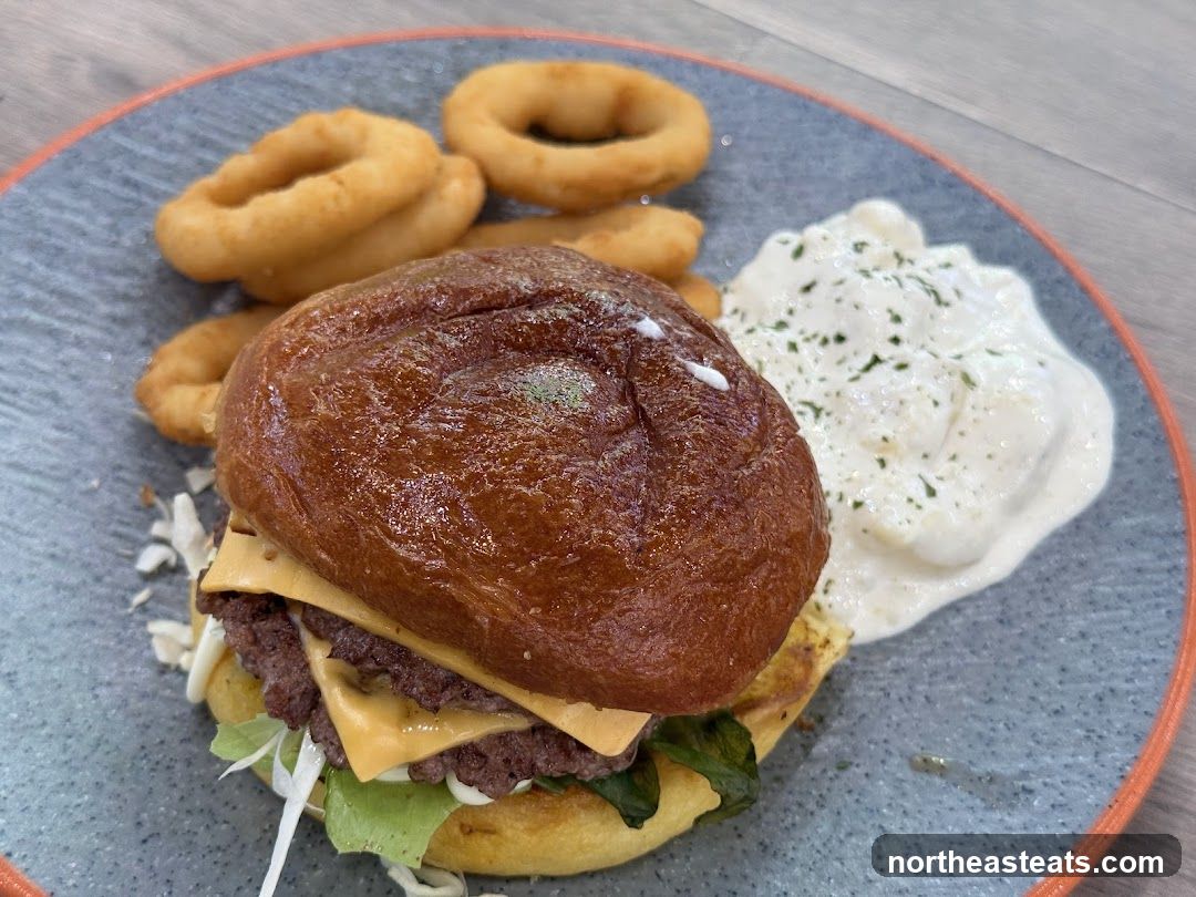 Burger with Onion Rings and Dip