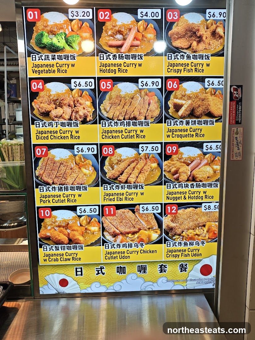A menu board displaying various Japanese curry rice and udon dishes with prices.