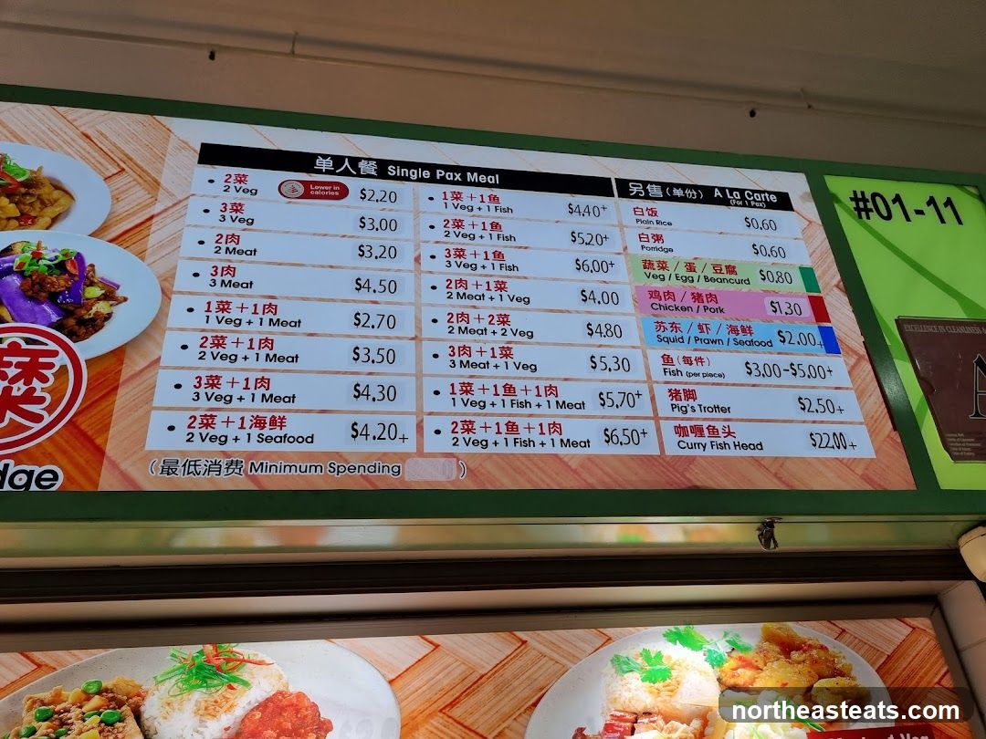 Menu with options for single pax meals and a la carte dishes, including vegetables, meats, fish, and seafood.