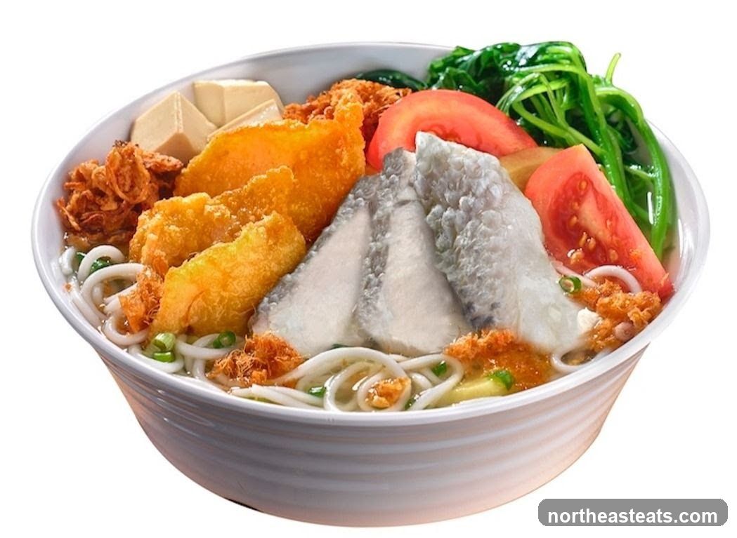 Bowl of Noodles with Fish and Vegetables