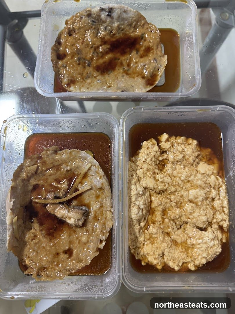 Three Takeout Containers of Food