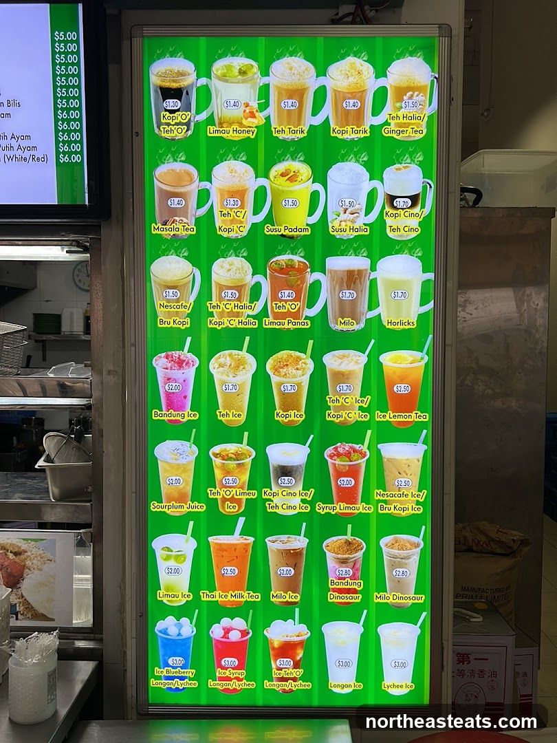 A brightly lit menu board displaying various drinks with images and prices.