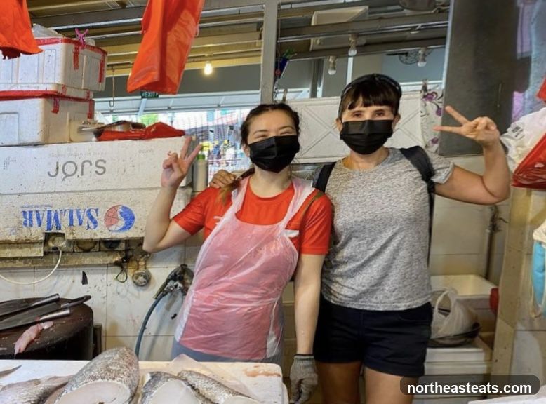 Two women at a fish stall