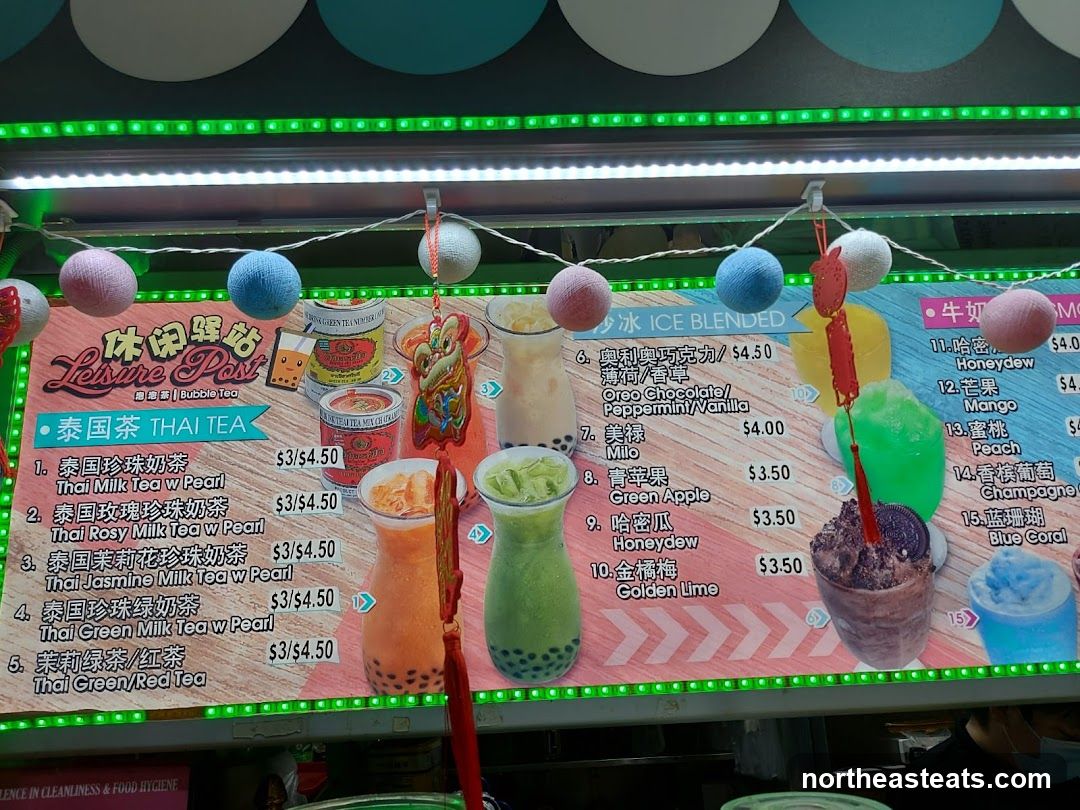 A menu board for Leisure Post Bubble Tea, featuring Thai Teas and Ice Blended drinks.