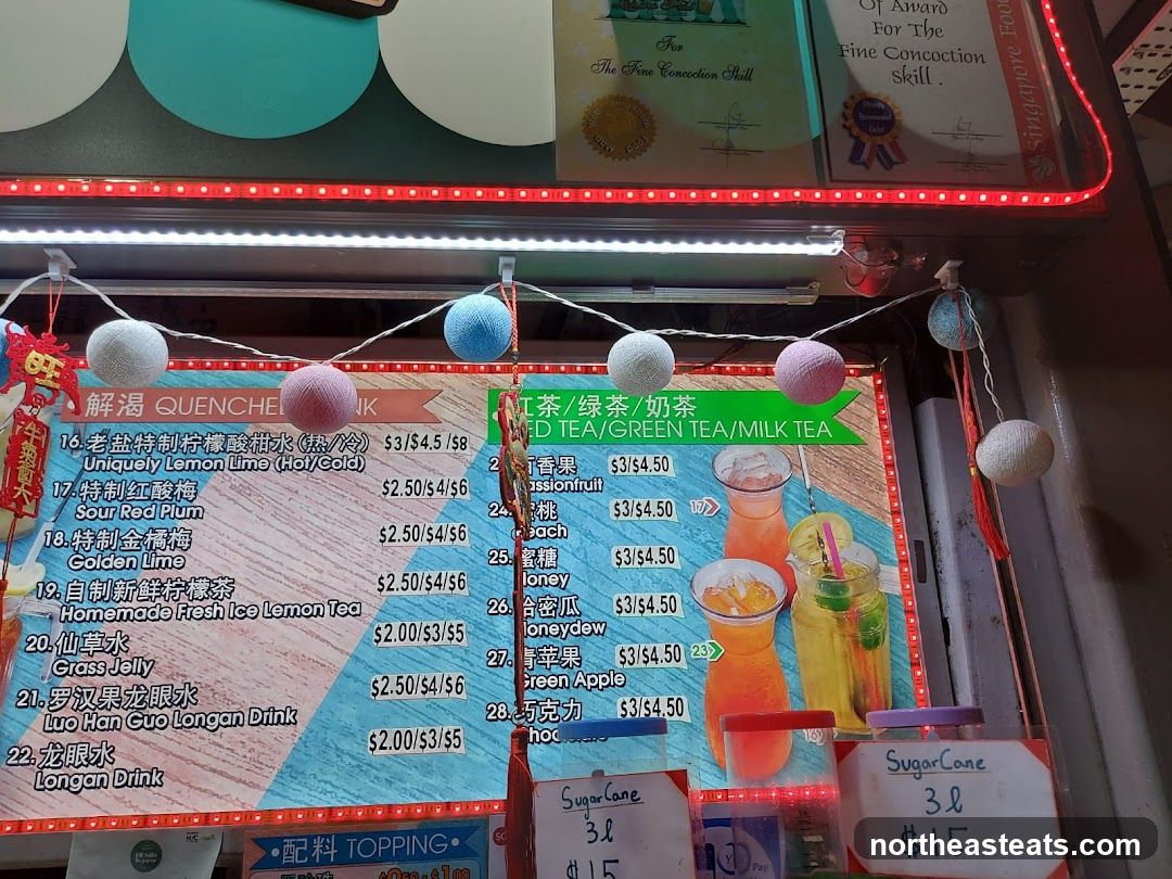 Menu for drinks including lemon lime, sour red plum, golden lime, homemade fresh ice lemon tea, grass jelly, luo han guo longan drink, longan drink, passionfruit, peach, honey, honeydew, green apple, chocolate, and sugarcane.