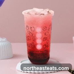 Red beverage with cartoon characters