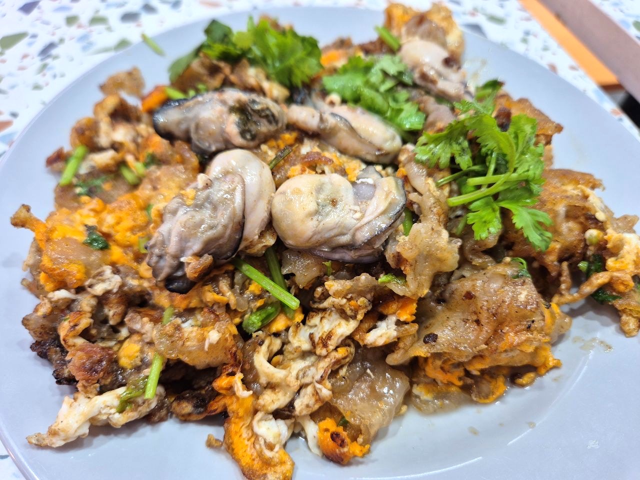 Orh luak with plump oysters and coriander at Hougang Oyster Omelette and Fried Kway Teow, 435A Hougang Avenue 8
